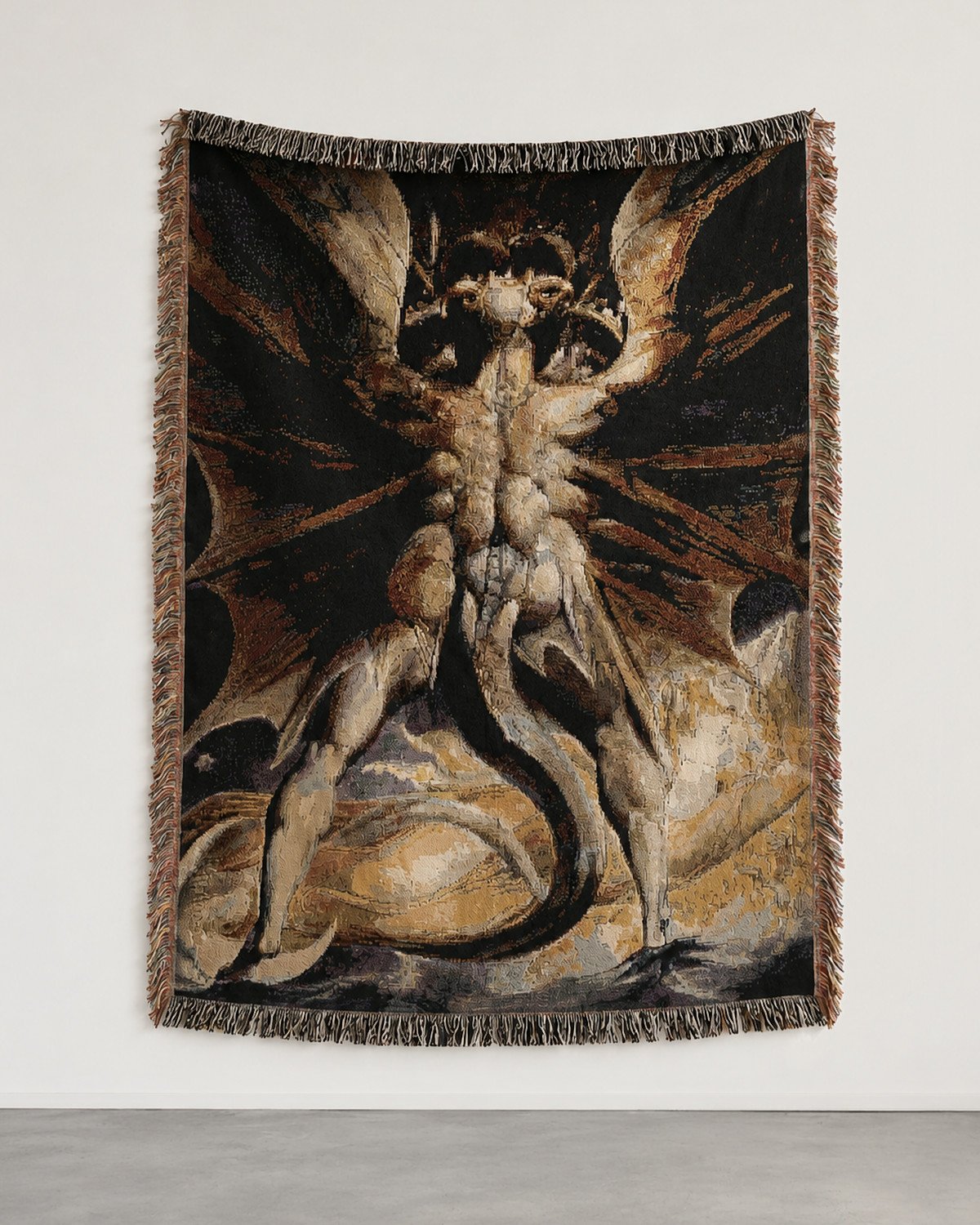 The Great Red Dragon woven blanket hung on a white gallery wall: the dragon seen from behind, wings spread over a woman clothed in light.