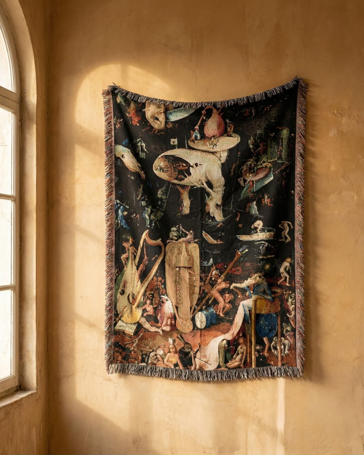 Bosch’s Hell blanket hung in an arched room in late sun.