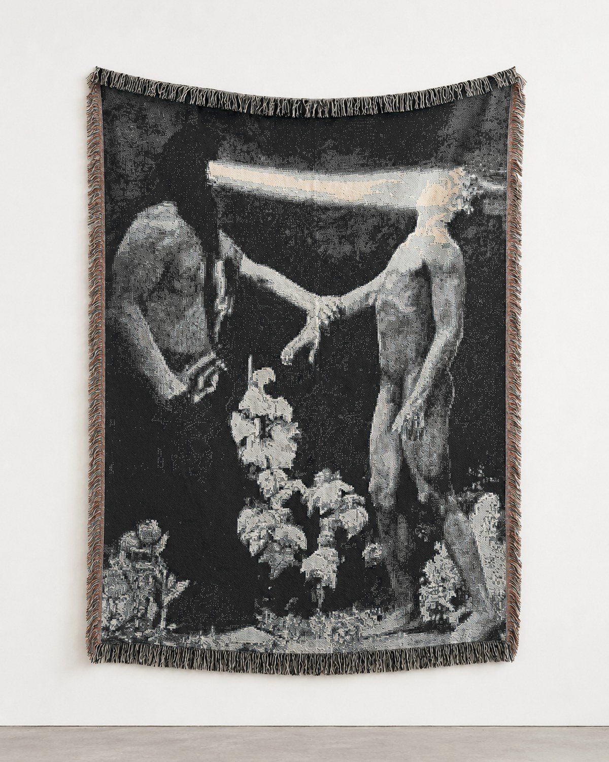 Hypnosis blanket hung on a plain white wall.